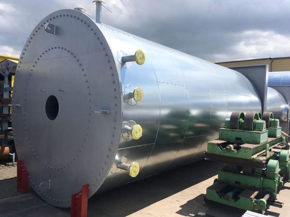 Equipment used for exhaust air purification for production of vinyl flooring outdoors prepping for install.