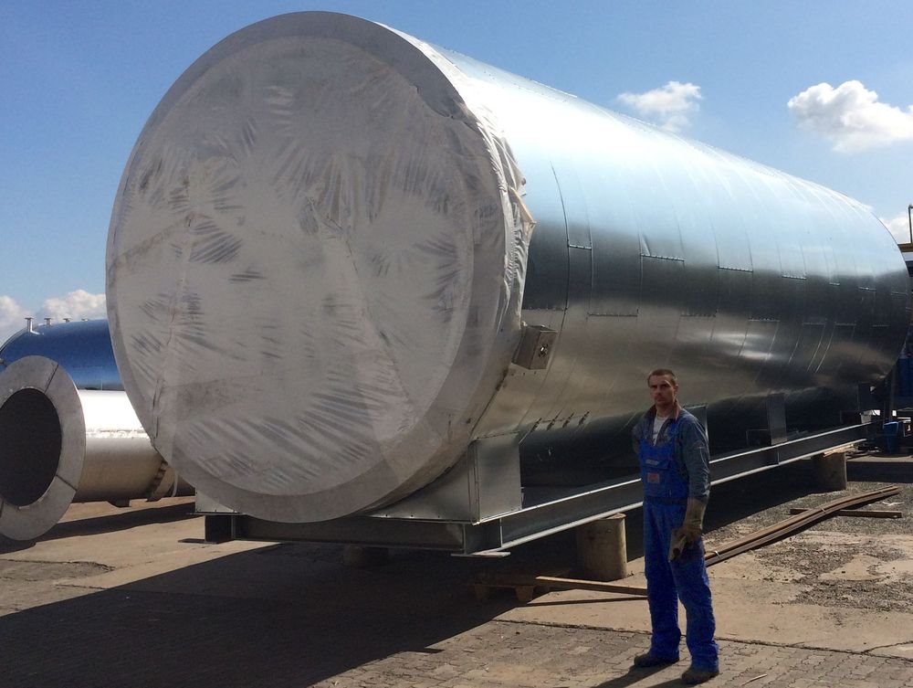 Equipment used for exhaust air purification for production of vinyl flooring on wooden pallets being delivered to facility.